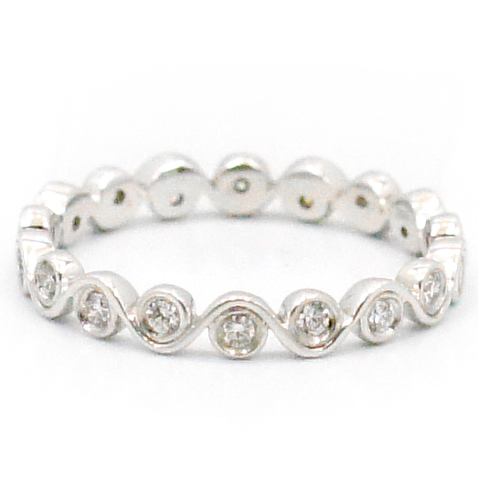 This is a picture of a Bezel Set Diamond Eternity Band set in 14k White Gold