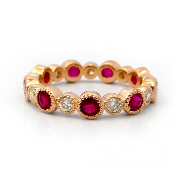 This is a picture of a Ruby and Diamond Band set in 14k Rose Gold