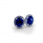 This is a picture of Oval Blue Sapphire with Diamond Halo Stud Earrings