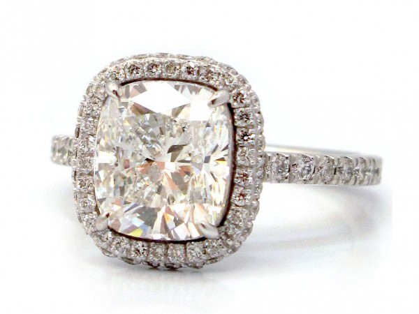 This is a picture of a Double Sided Halo and Diamond Band for Cushion Cut Diamond
