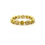 This is a picture of an Alternating Marquise and Round Bezel Fancy Yellow Diamond Eternity Band