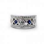 This is a picture of a 5 Stone Diamond and Princess Cut Blue Sapphire Ring