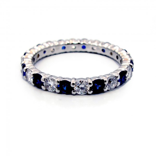 This is a picture of an Alternating Diamond and Blue Sapphire Eternity Band