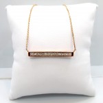 This is a picture of a Princess Cut Diamond Bar Necklace Set in 14k Rose Gold