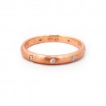 This is a picture of a Brushed Rose Gold Band with Burnish Set Diamonds