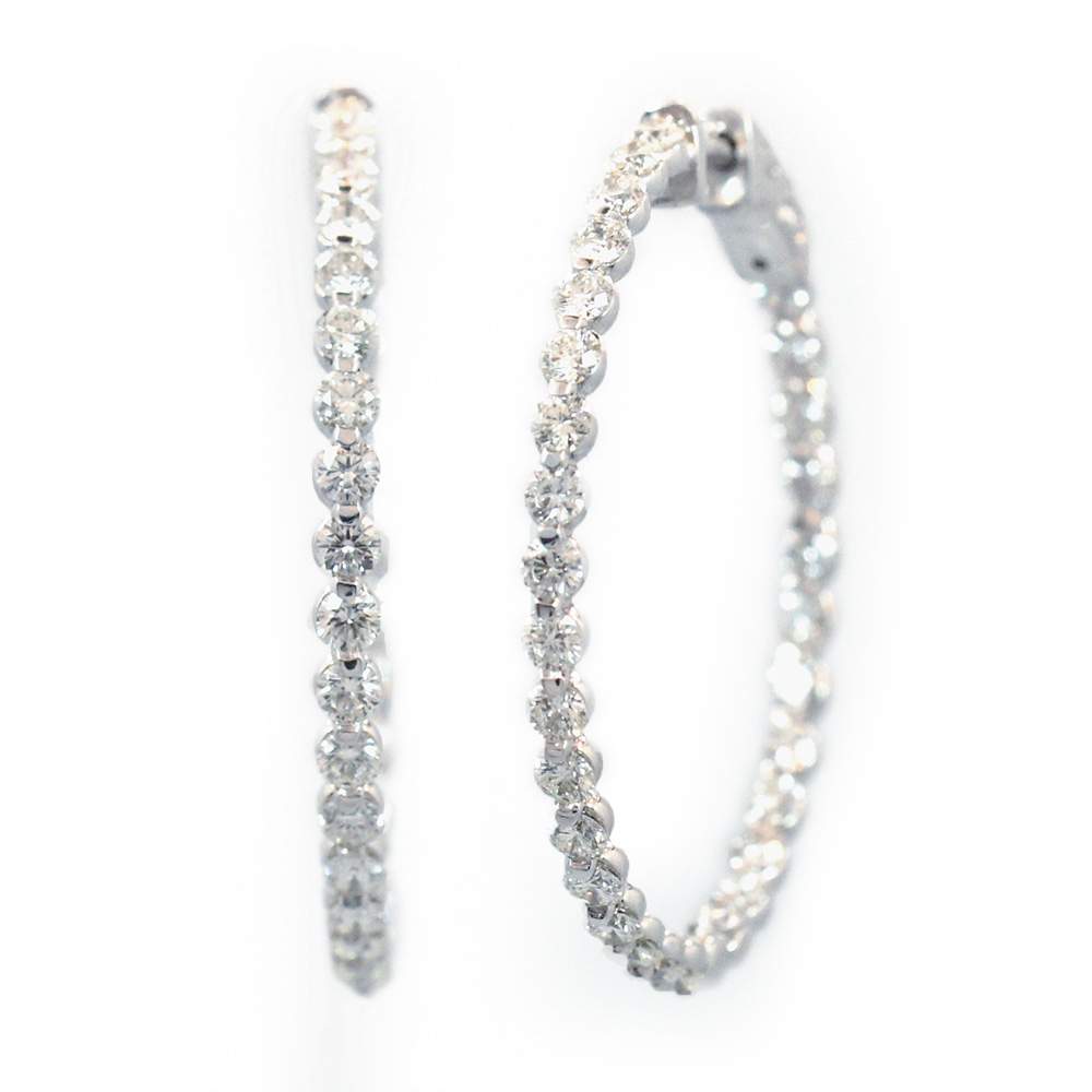 This is a picture of 14k White Gold Diamond Hoop Earrings