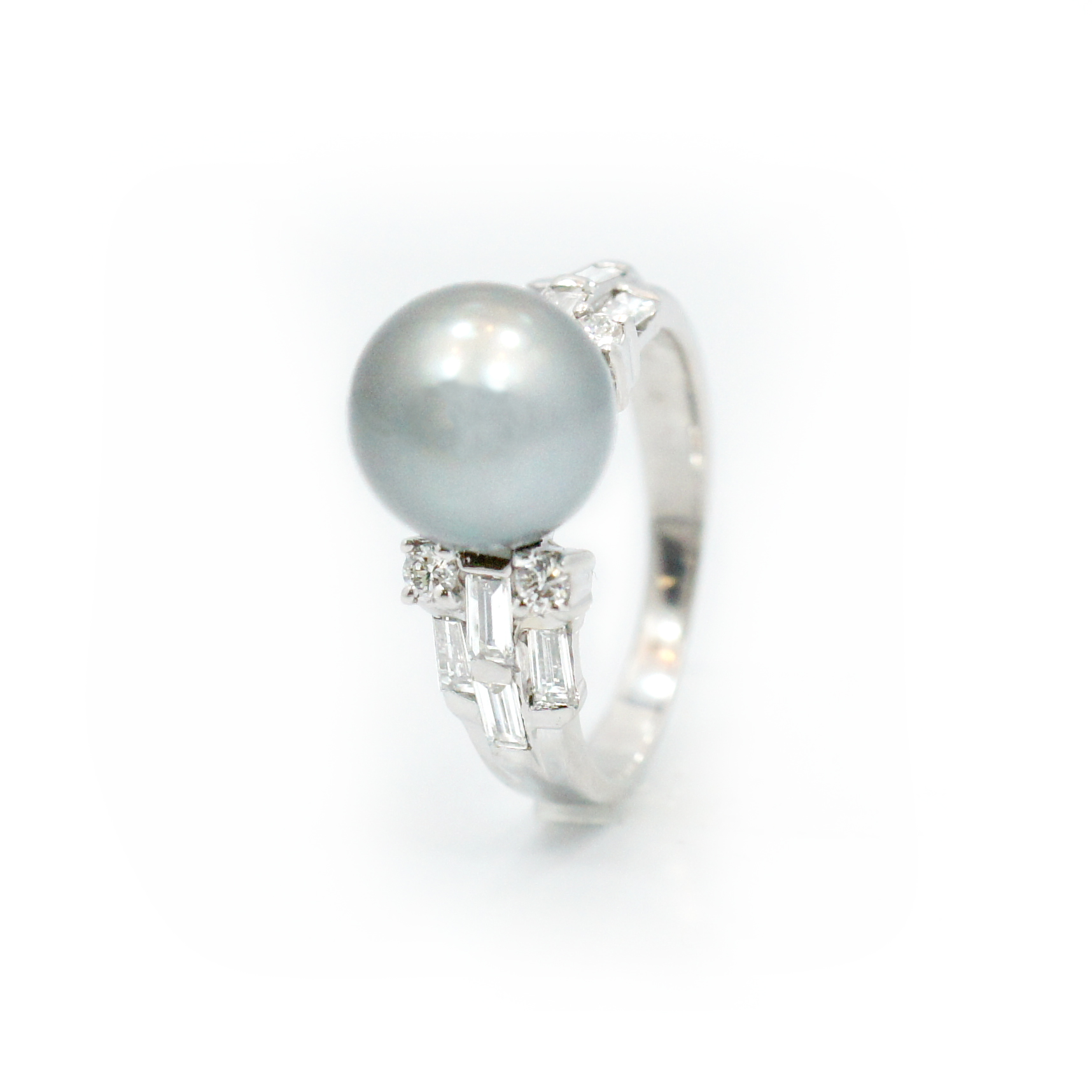 This is a picture of a Tahitian Pearl and Diamond Ring in 18k White Gold