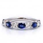 This is a picture of a Diamond and Blue Sapphire Alternating Eternity Band