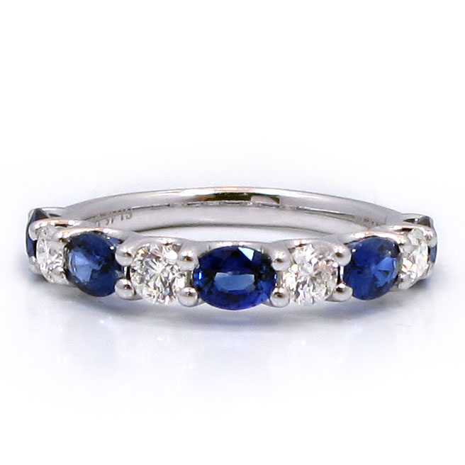 This is a picture of a Diamond and Blue Sapphire Alternating Eternity Band