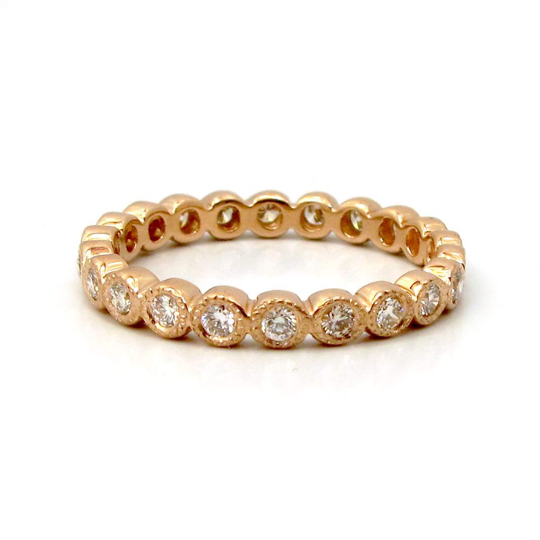 This is a picture of a Diamond Eternity Band set in 14k Rose Gold