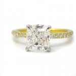 This is a picture of a 18k Yellow Gold Shared Prong Diamond Engagement Ring