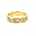 This is a picture of a 14k Yellow Gold Diamond Floral Style Band