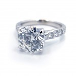 This is a White Gold Shared Prong Setting with 16 Graduated Diamond Band