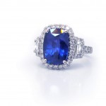 This is a picture of a Cushion Cut Blue Sapphire and Diamond Ring in Platinum