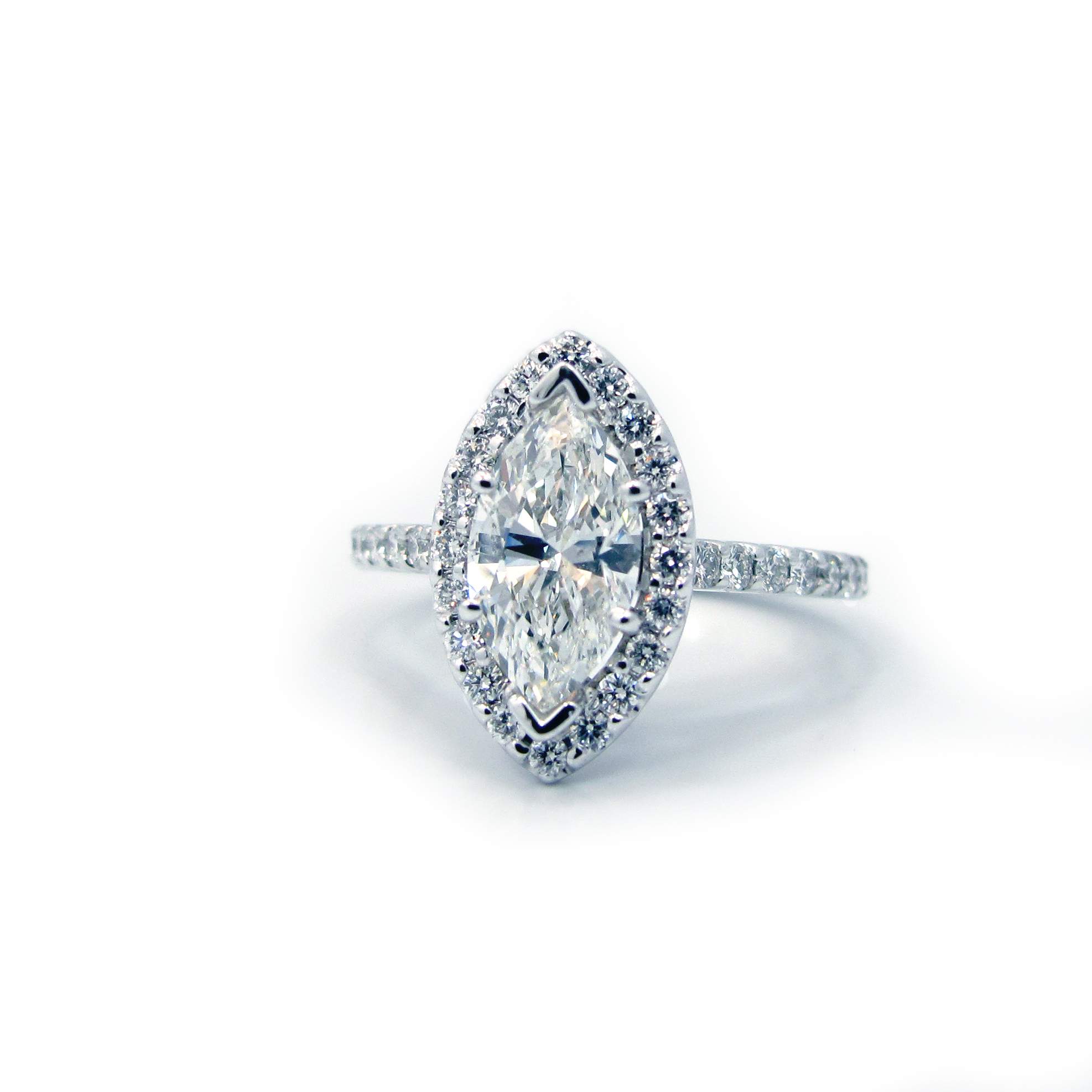 This is a picture of Marquise Diamond Halo Engagement ring