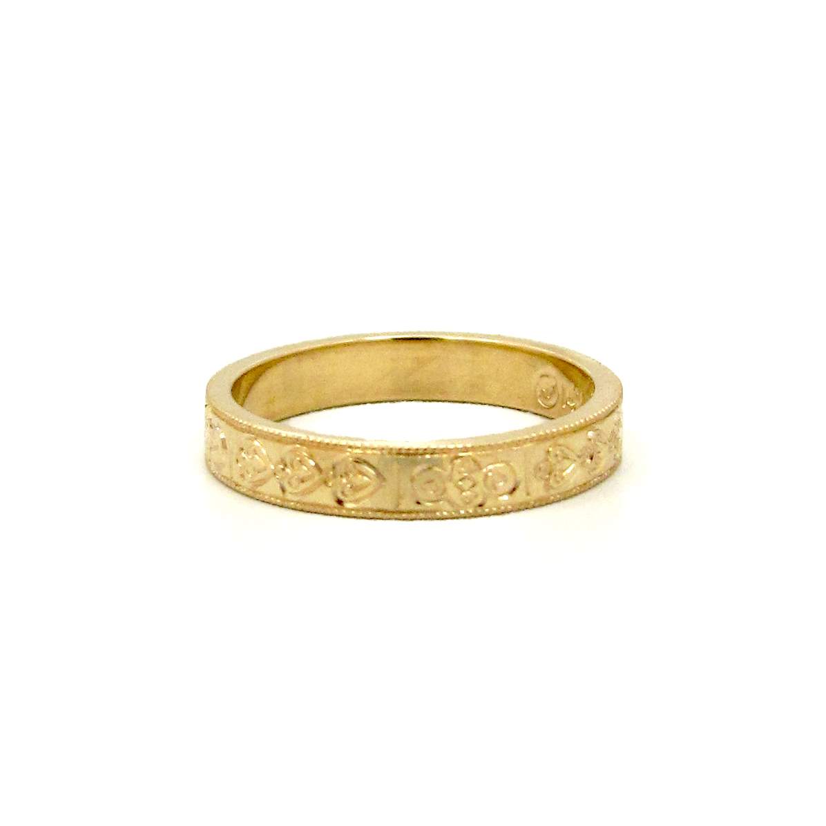 This is a picture of a Custom Engraved 14k Yellow Gold Wedding Band