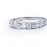 This is a picture of a Round Brilliant Diamond and Baguette Wedding Band