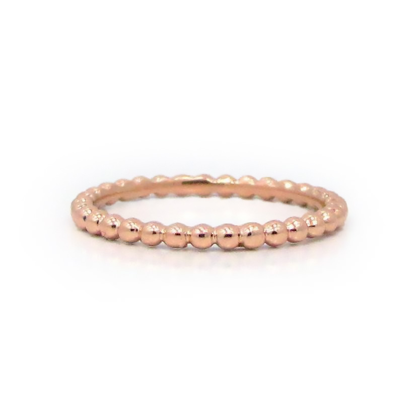 This is a picture of a 14k Rose Gold Bead Band