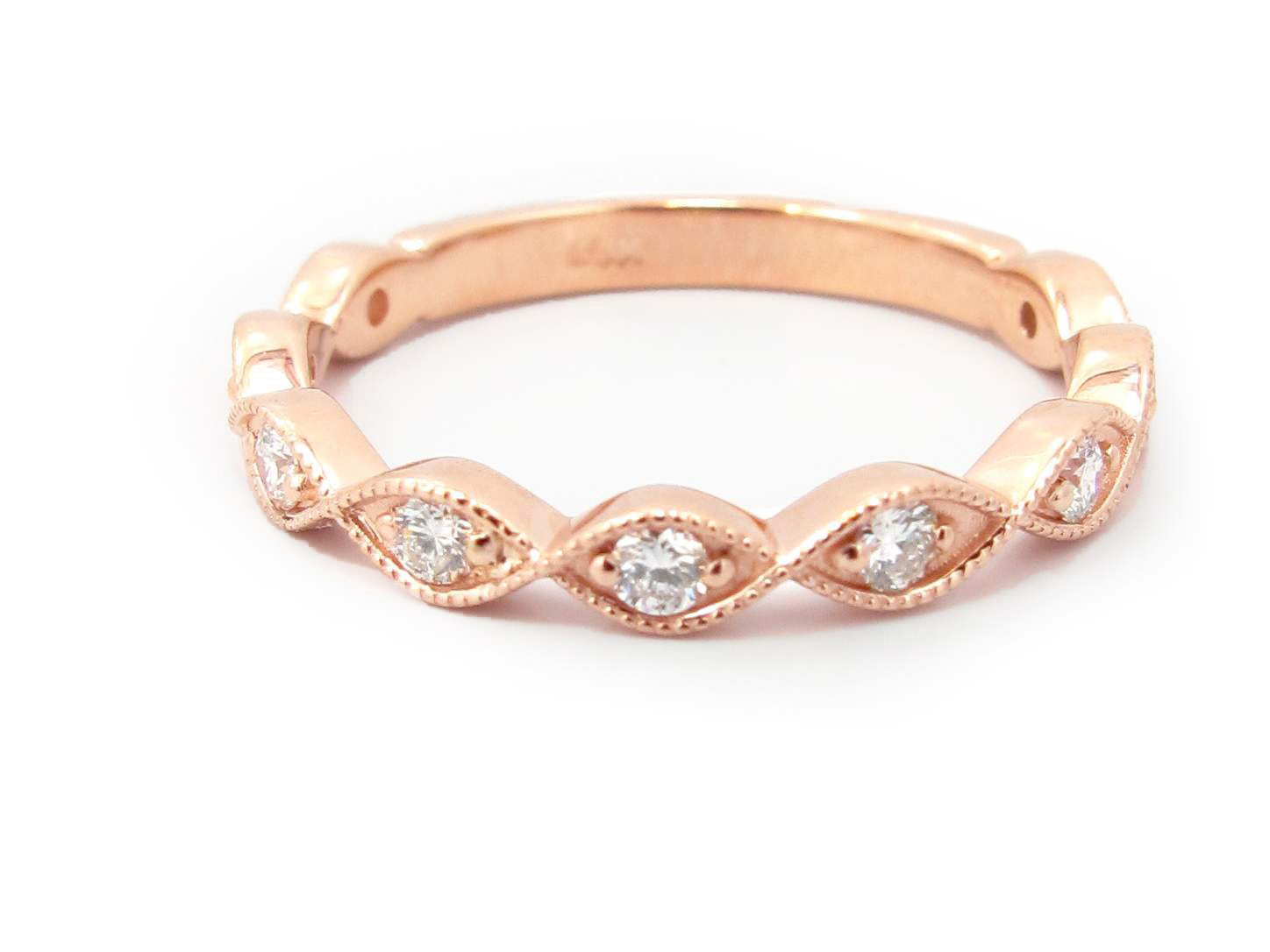 This is a picture of a Round Diamond in Marquise Bezel Band in 14k Rose Gold