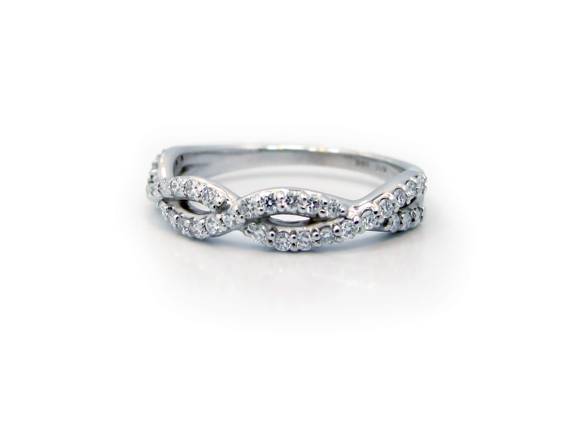 This is a picture of a 14k White Gold Twisted Diamond Band