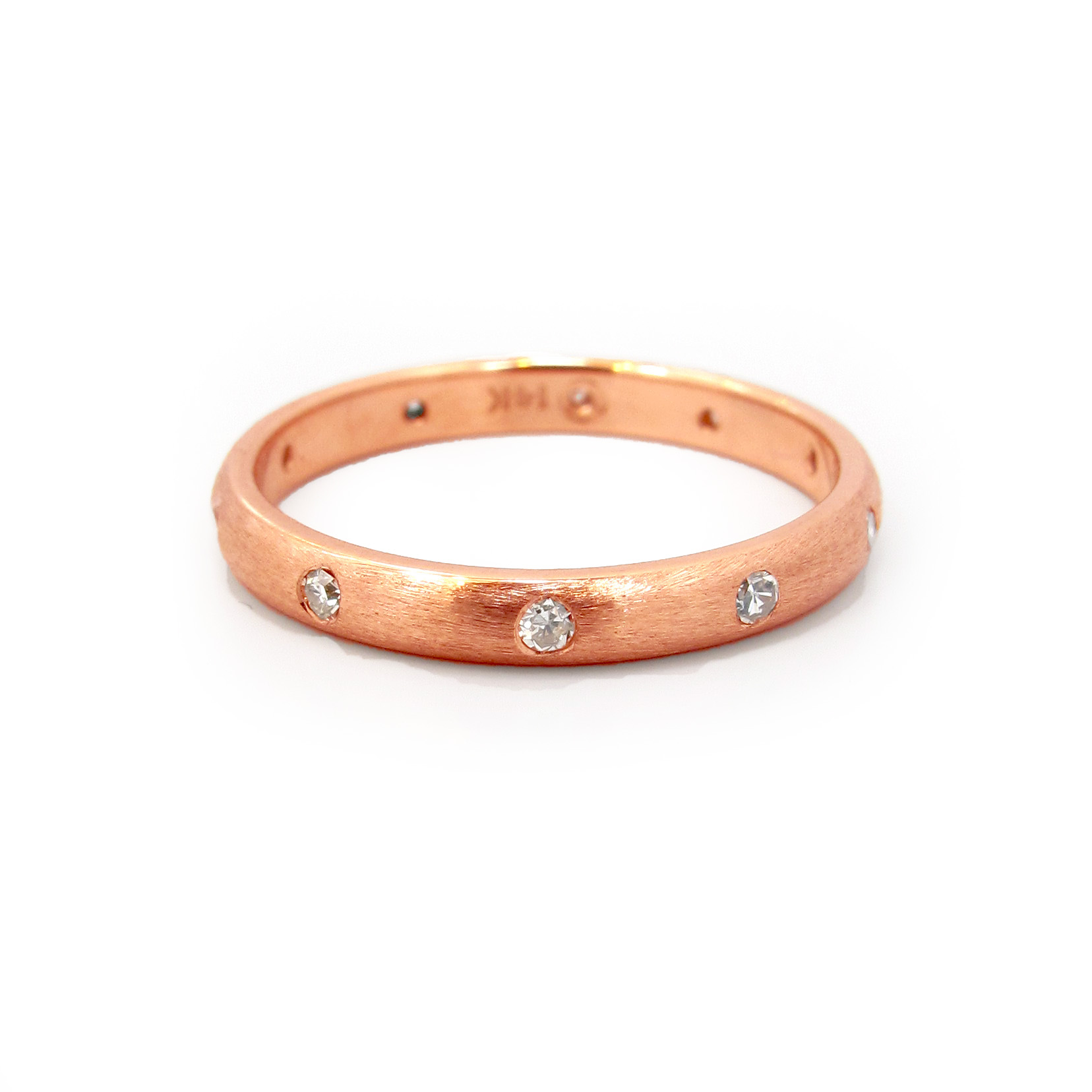 This is a picture of a Brushed Rose Gold Band with Burnish Set Diamonds