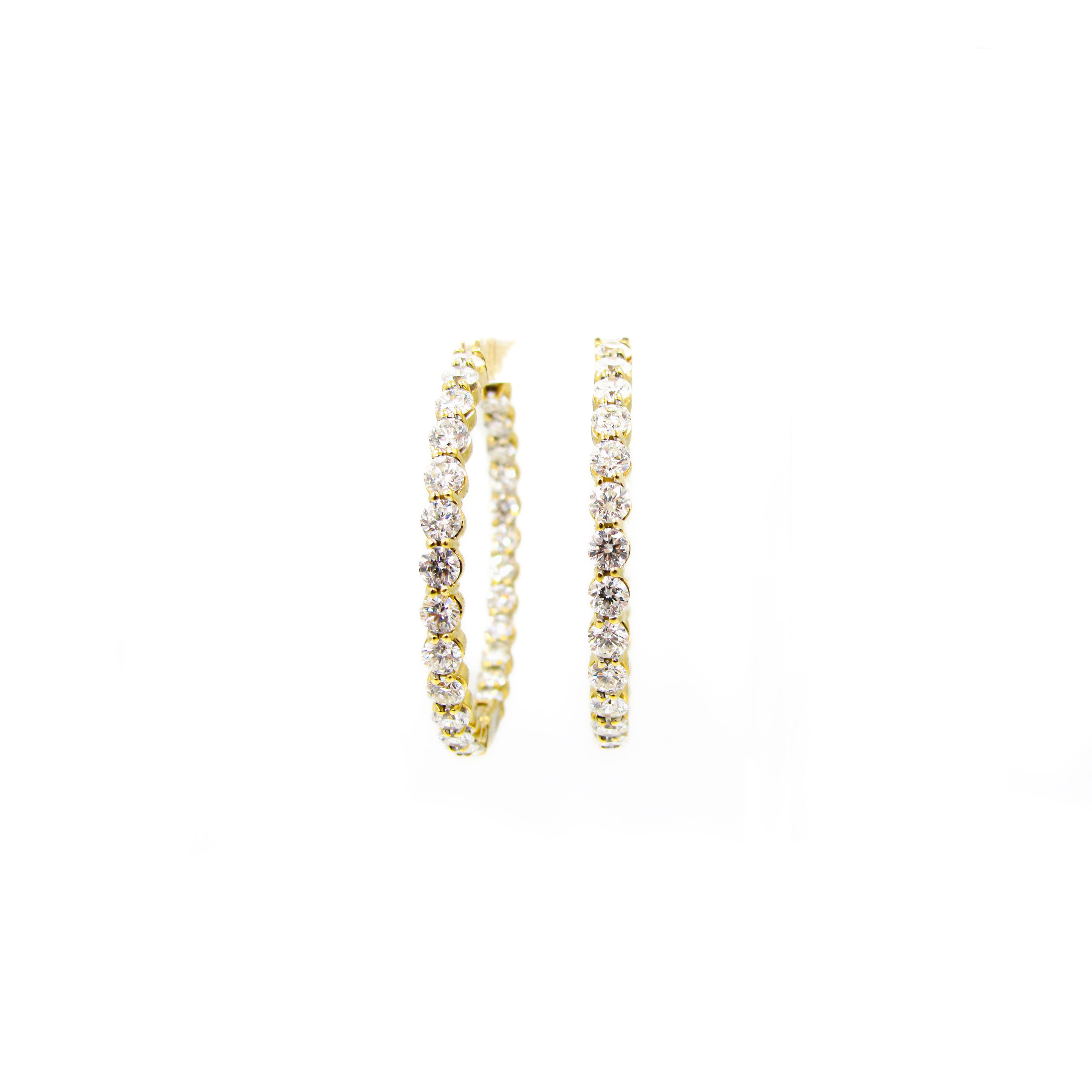 This is a picture of 18k yellow gold diamond inside out hoops