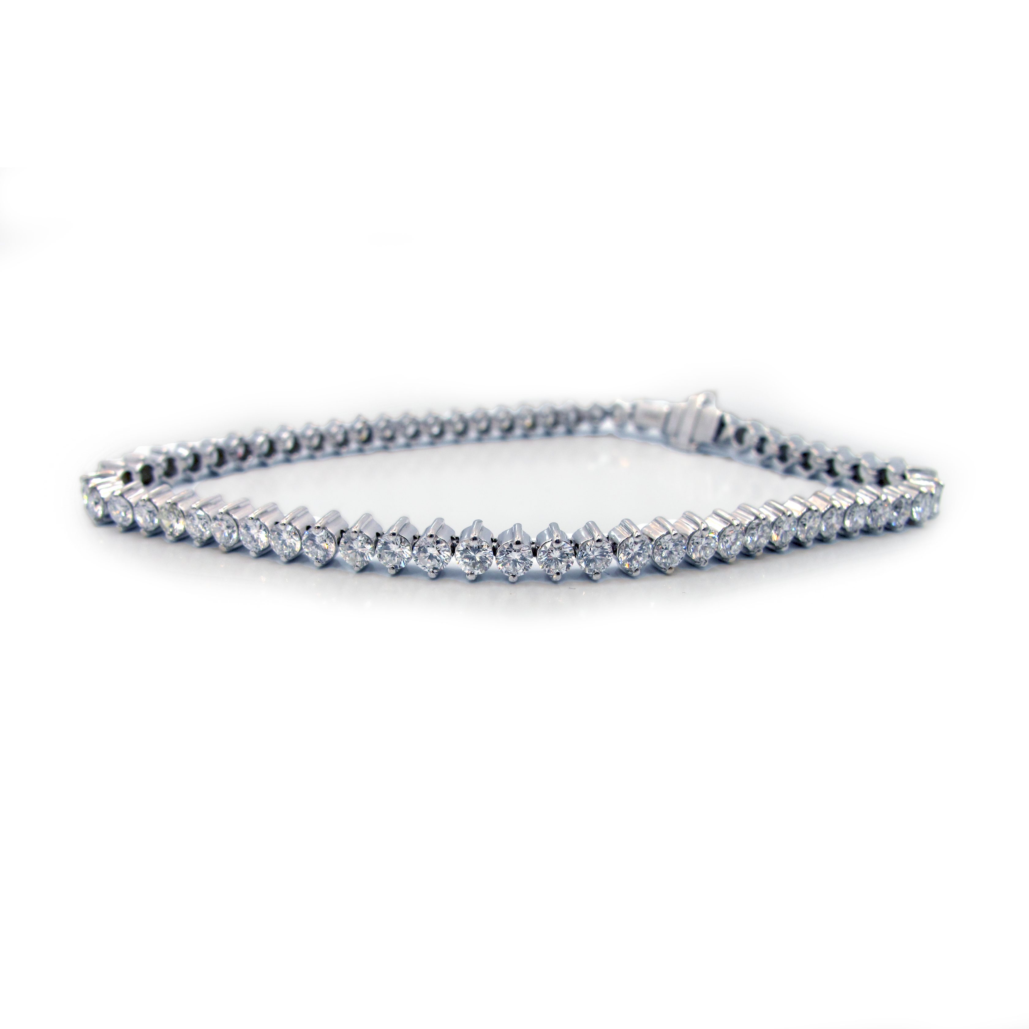 This is a picture of an 18K White Gold and Diamond Two Prong Tennis Bracelet