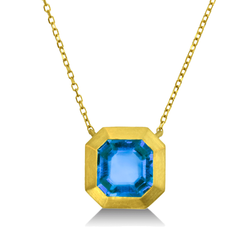 this is a picture of a Blue Topaz octagon gold necklace